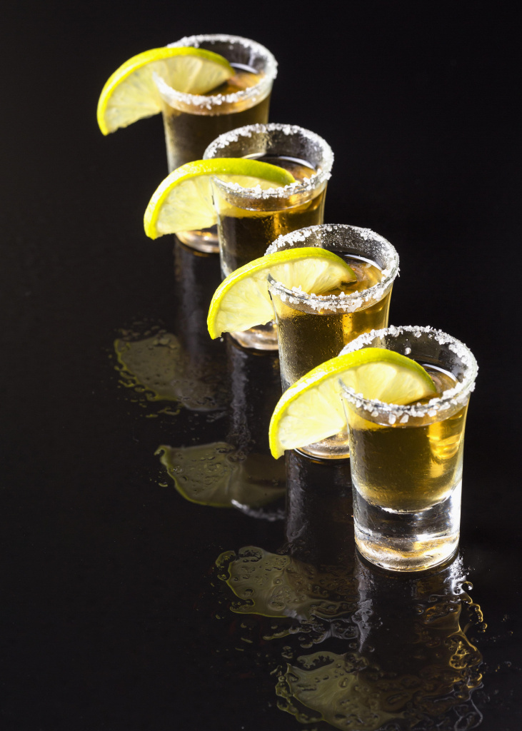 high-angle-line-gold-tequila-shots.jpg
